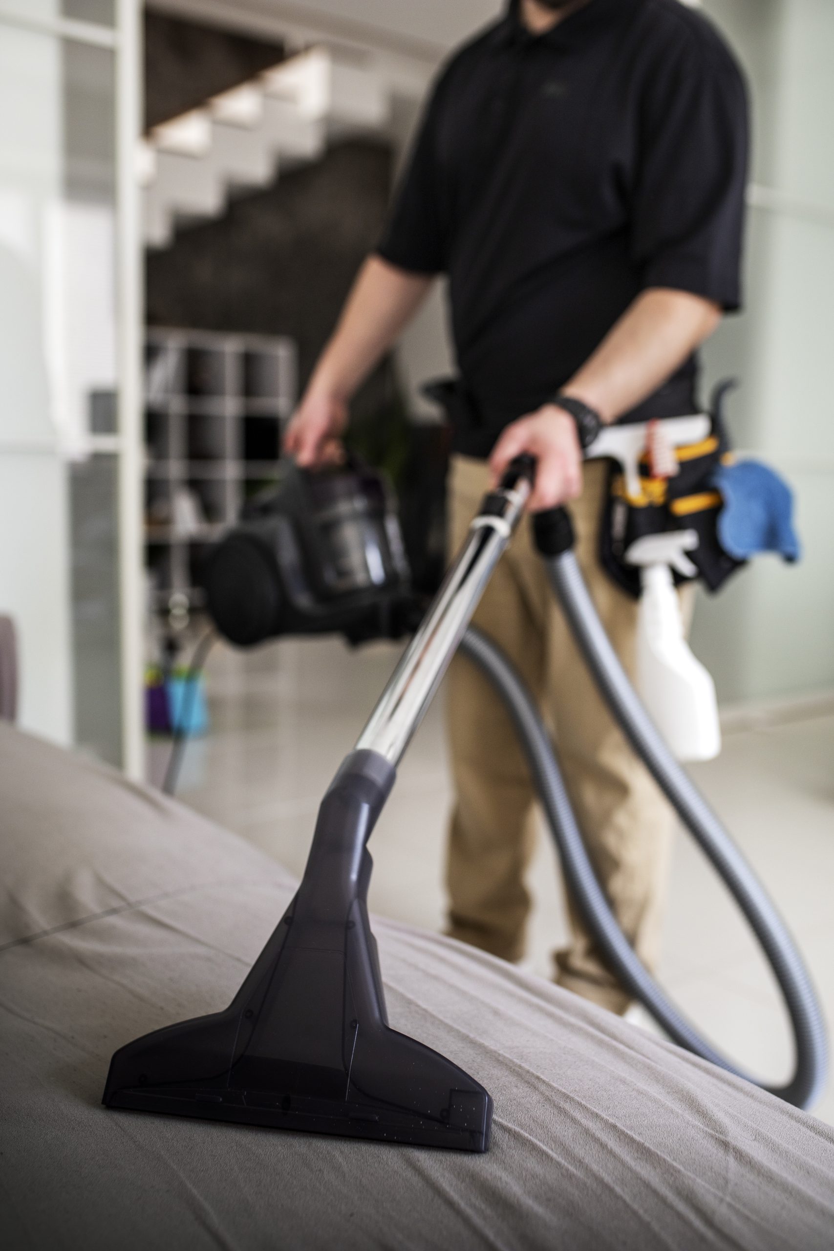 Bright Delight Cleaning Services technician performing sofa deep cleaning – Cleaning Services Ajman.
