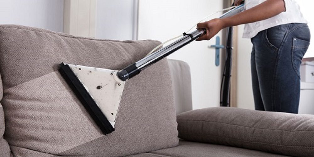 rofessional sofa cleaning service using vacuum extraction method in Al Nuaimiya, Ajman